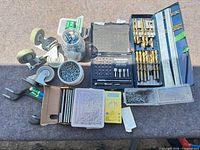 Overall view of all tools, casters, fasteners and multimeter