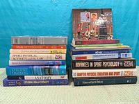 Both stacks of 19 books including visible titles