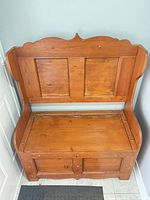front view of wood bench showing backrest and seat