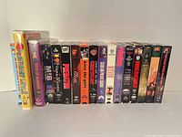 All seventeen VHS tapes lined up spine-out