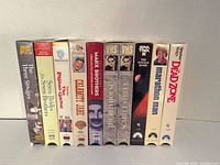 Front spines of all ten VHS tapes aligned