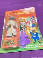 Front view of sealed Professor figure on card with McDonaldland graphics