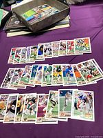 All cards laid out on table in three rows