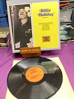 Front cover of Billie Holiday Volume II LP on stand with record displayed