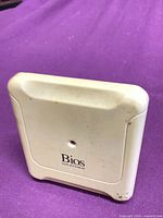 Front view of Bios Weather sensor showing branding and sensor aperture