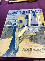 Front cover showing title, illustration, damage, store stamp