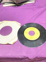 Record and generic sleeve on surface