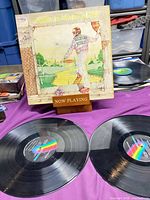 Front cover of gatefold sleeve displayed upright