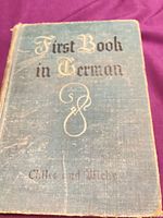 Front cover of textbook showing title and wear