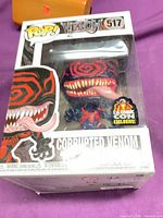 Front view of boxed Corrupted Venom #517 showing character and box wear