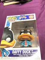 Front view of boxed Funko Pop Daffy Duck figure