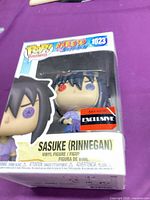Front of boxed Funko Pop showing figure and AAA Anime Exclusive sticker