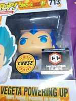 Front of boxed Funko Pop Vegeta #713 showing chase and exclusive stickers