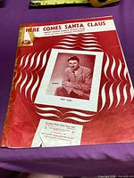 Front cover of sheet music showing title, graphic design and portrait