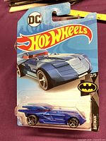 Front view of sealed Hot Wheels Batman Batmobile card showing car, graphics, series 2/5, 17/250