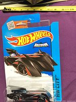 Front of Hot Wheels Batmobile package showing car and artwork