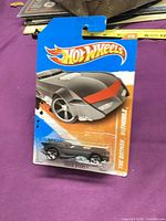 Front view of sealed Hot Wheels Batmobile on card
