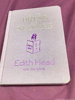 Front cover showing title, author, illustration, lavender cloth