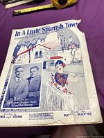 Front cover with title, illustration and performer photo