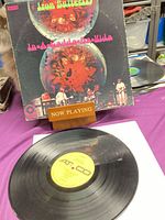 Front cover of Iron Butterfly LP with vinyl on white sleeve