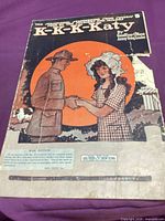 Full front cover with illustration, showing overall wear and corner loss