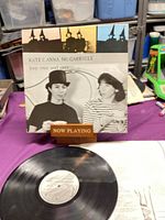 Front jacket with record and lyric sleeve visible