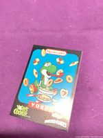 Front of Kellogg's Frosted Flakes Nintendo Yoshi's Cookie promotional trading card featuring Yoshi graphic.