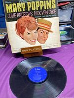 Front sleeve and vinyl record displaying blue Vesgo label, illustrating wear on sleeve and record surface