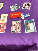 Overall lot showing all stickers laid out on purple background