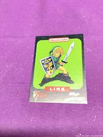 Front view of Link trading card showing artwork and Nintendo/Zelda logos