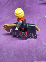 Knight figure on horse, side view
