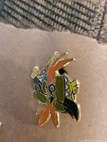 Front of hard-enamel Pokémon pin showing character design and colors
