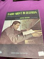 Full front cover of Rainy Night in Georgia sheet music on purple background