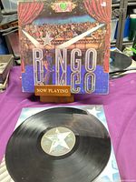 Front of outer jacket and record on turntable mat