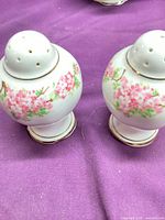 Front view of both shakers showing pattern and shape
