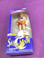 Front of boxed Sailor Venus Adventure Doll