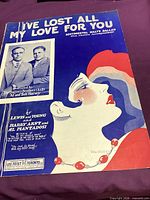 Front cover of sheet music showing title, artwork and inset photo