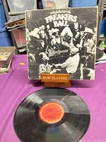 Front sleeve artwork and record on table