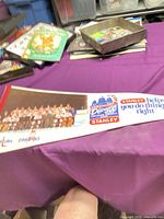 Full pennant displaying team photo and promotional graphics