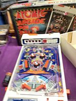 Full view of Tomy Atomic Arcade Pinball game and box