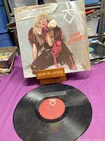 Front cover of Twisted Sister Stay Hungry LP with record displayed