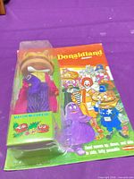 Front view of blister-carded Mayor McCheese figure with full card artwork visible