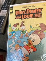 Front cover of bagged comic showing main artwork and 60¢ price