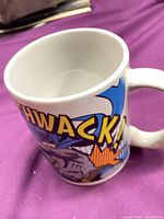 Mug side showing THWACK! Batman comic graphic