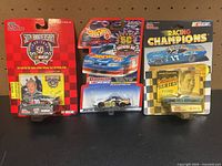 Group shot of all three sealed 1:64 die-cast NASCAR cars