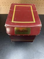 Maroon Classic Cars storage box, worn edges