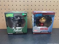 Front view of both boxed figures