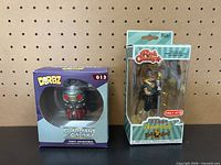 Front view of both boxed figures