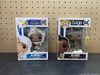 Front view of both boxed figures