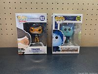 Front view of both boxed figures